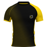 Hexline Rash Guard front – black and gold geometric pattern with yellow sleeve